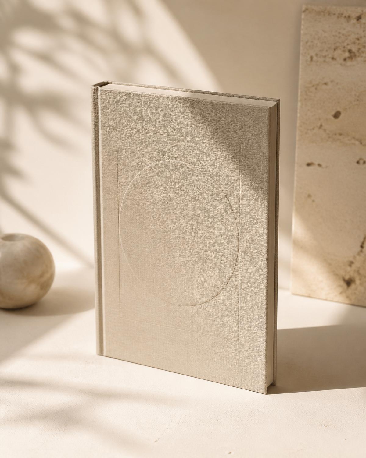 A premium hardback in warm natural light
