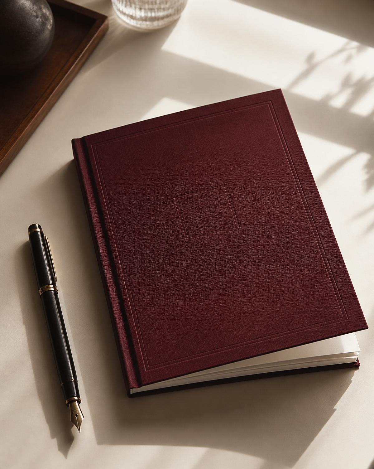 A minimal workbook resting on a wooden table